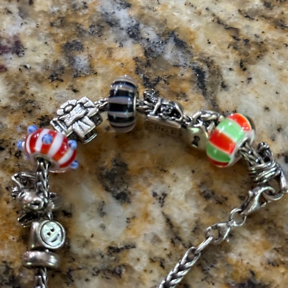 Rare & Retired Pieces.Beautiful bracelet with special charms. - Picture 4 of 16